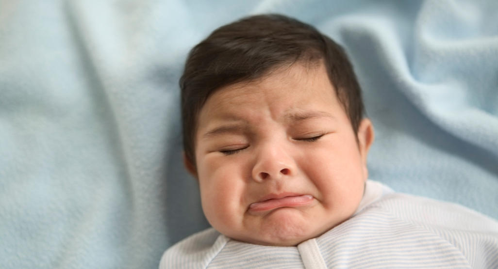 upset baby crying