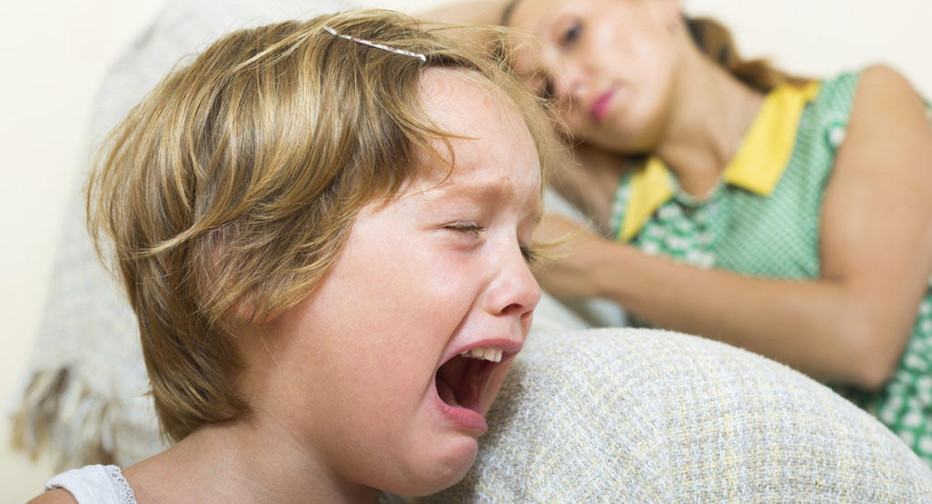young girl crying while mother is trying to ignore her