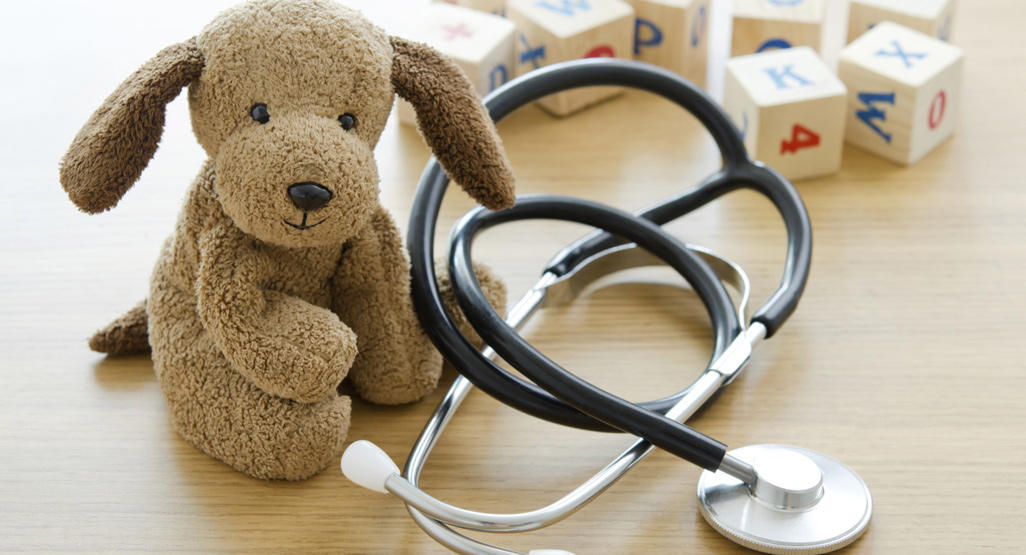 toys and stethoscope on a table