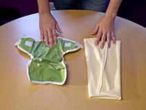 diaper and cover laying side by side