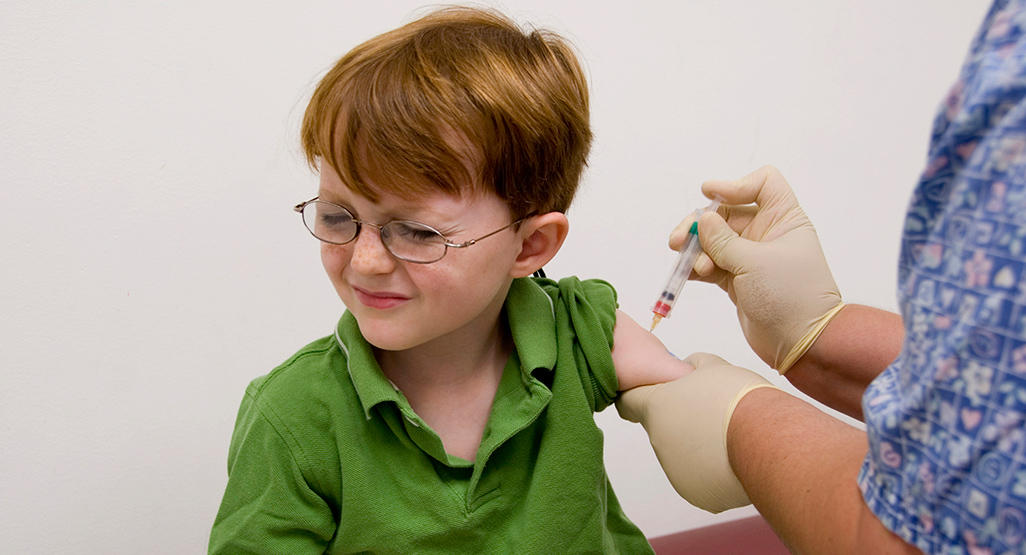 boy getting vaccinated