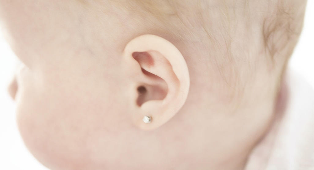 earring on a baby's ear