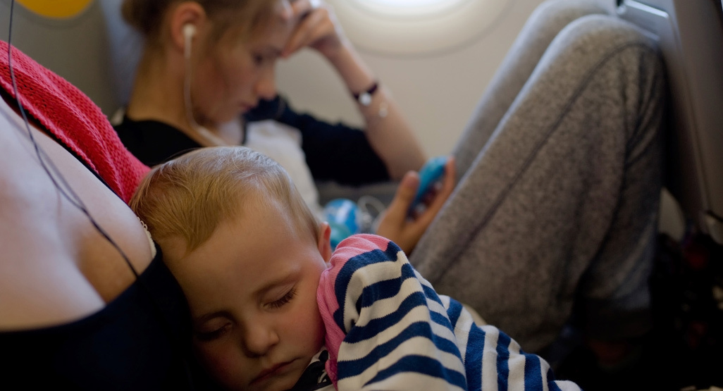 mom and child on a plane