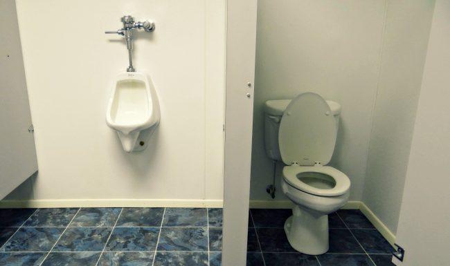 Bathroom with toilet and urinal