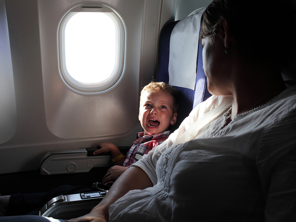 crying kid on a plane